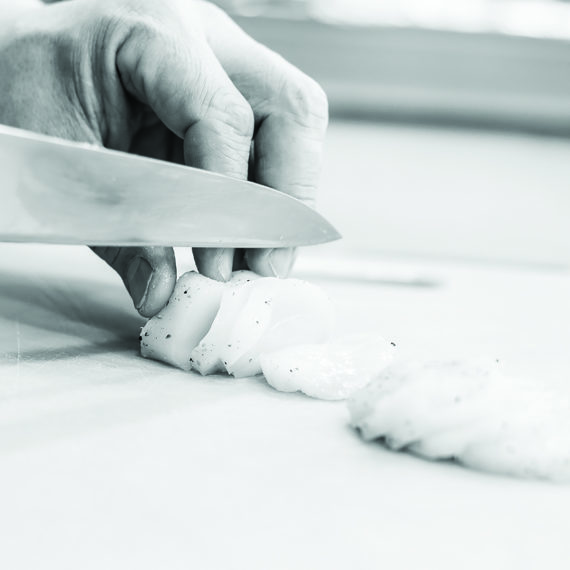 Chef Cutting Scallops